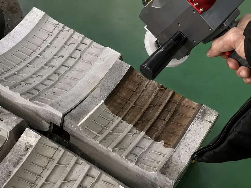 Laser cleaning mold residue for manufacturing maintenance